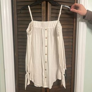 Cream colored off the shoulder long sleeve